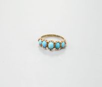 An early 19th century yellow metal and graduated five stone cabochon turquoise half hoop ring,
