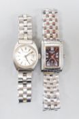 Two lady's stainless steel Longines wrist watches, one automatic and one with diamond set