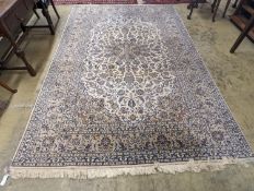 A Nain ivory ground carpet, 315 x 214cm