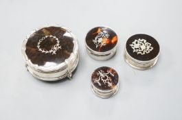 A George V silver and tortoiseshell pique circular trinket box, Birmingham, 1923, 61mm and three