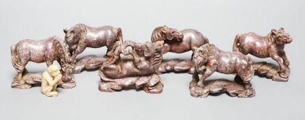 Six Chinese soapstone models of horses and a similar monkey, early 20th century