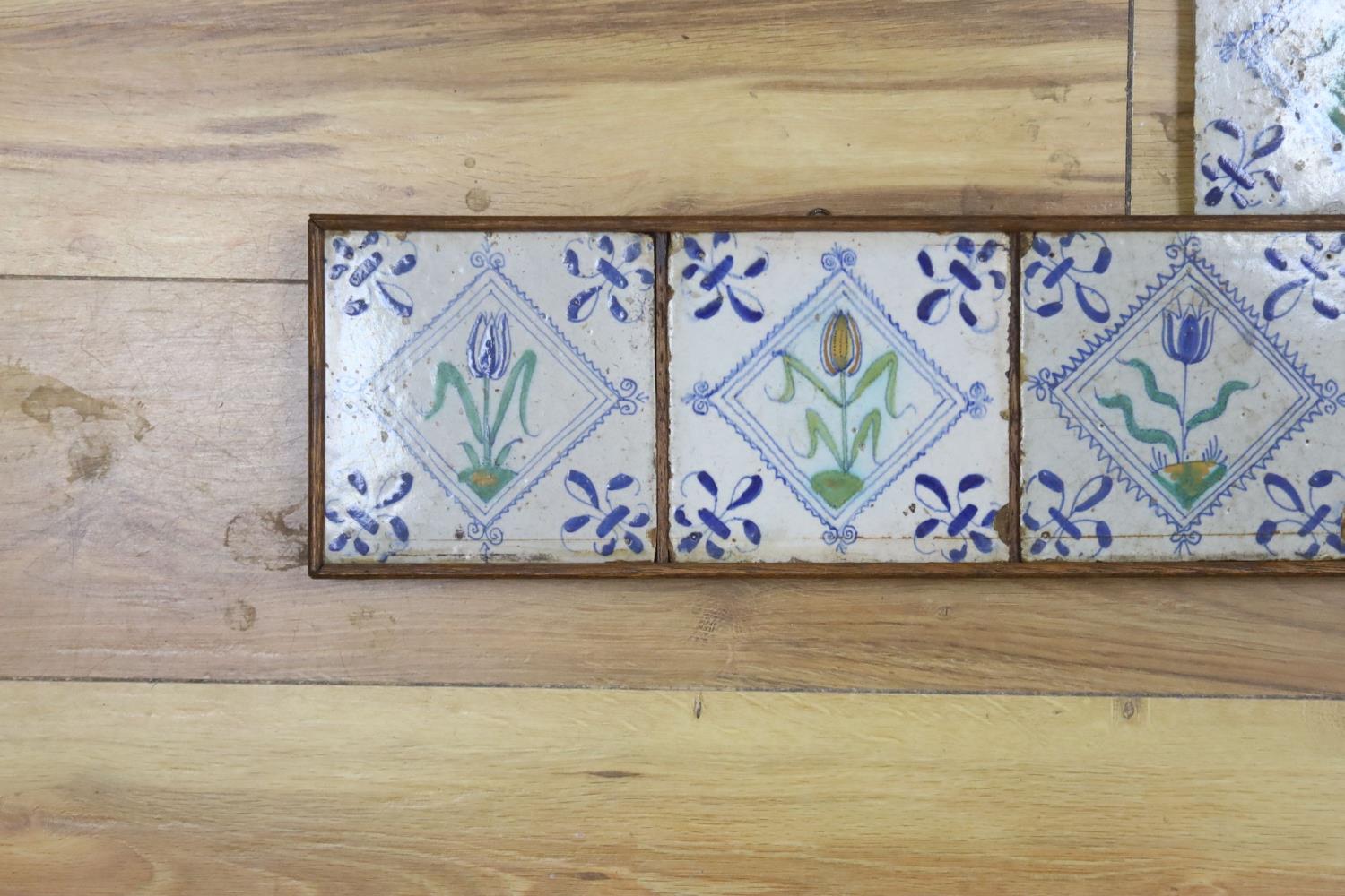 Seven 17th century Dutch Delft tiles, polychrome-decorated with tulips and having fleur-de-lys - Image 2 of 4