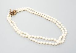 A double strand cultured pearl choker necklace, with cultured pearl set 9ct gold clasp, 38cm, with