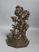 A 19th century bronze putti door stop, 33cm