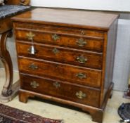 An 18th century and later feather banded walnut chest with slide, width 84cm, depth 49cm, height