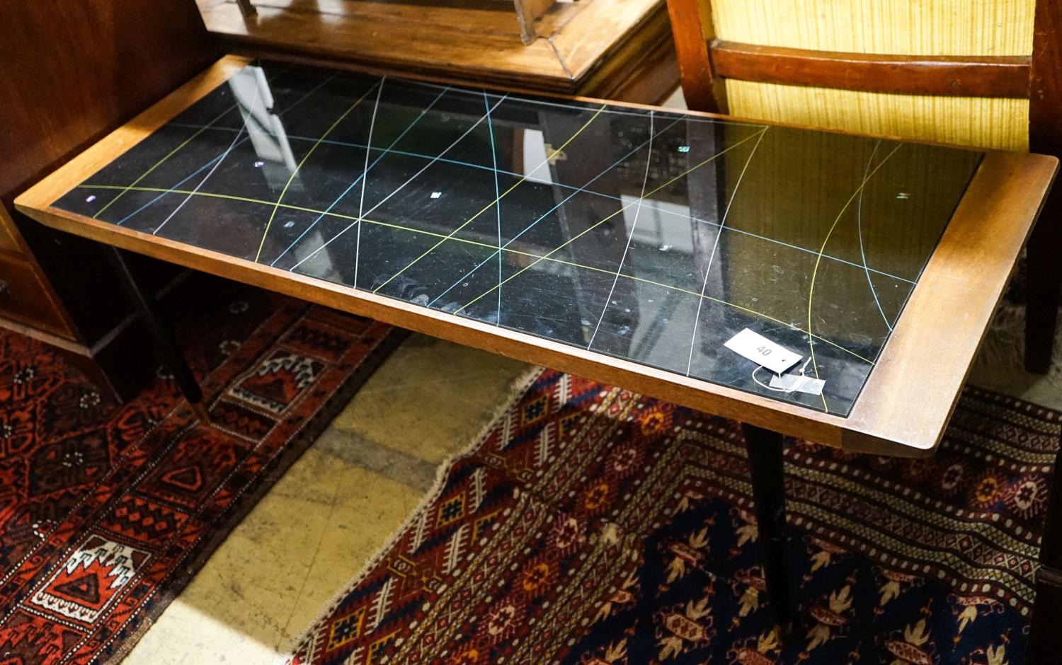 A mid century design teak and perspex 'Galaxy' rectangular coffee table, width 129cm, depth 46cm,