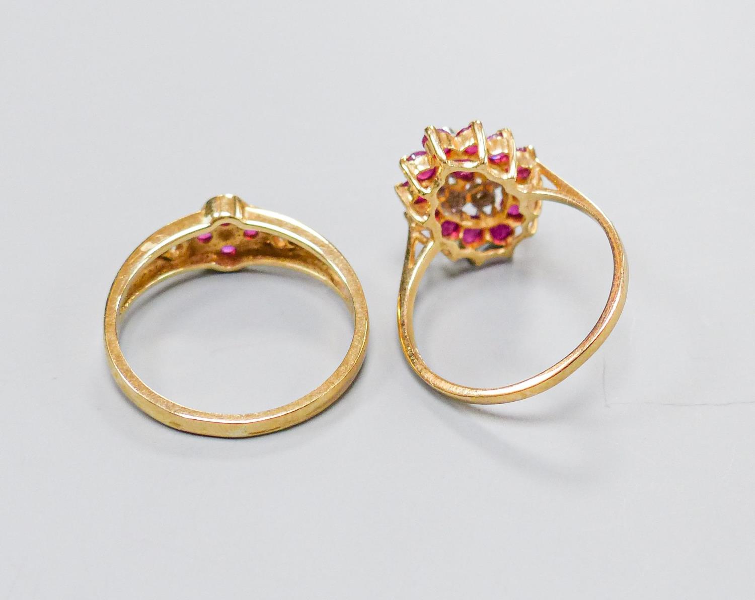 A 9ct yellow gold, ruby and diamond oval cluster ring, size M and another similar 9ct ring, gross - Image 4 of 4
