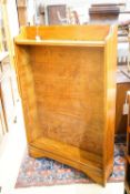 An early 20th century oak open bookcase, width 91cm, depth 20cm, height 140cm