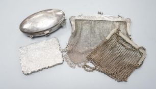 A late Victorian engraved silver card case, Birmingham, 1877, 10cm, a silver mesh evening purse