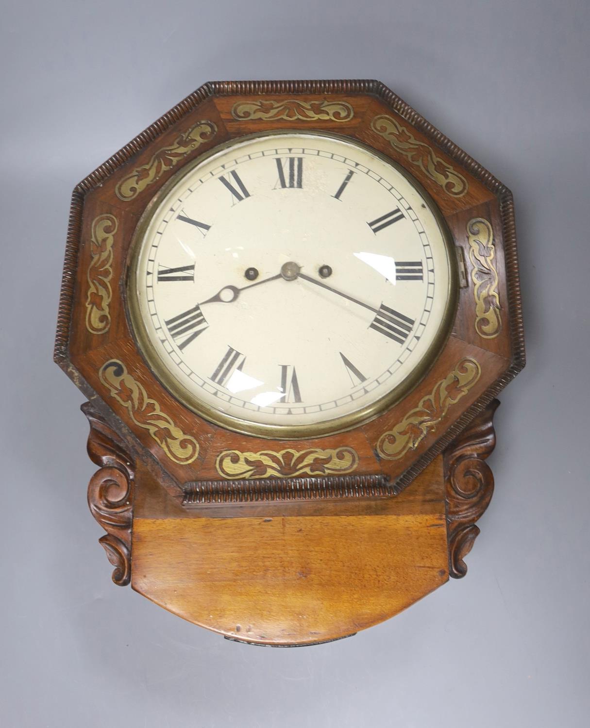 A 19th century rosewood and cut brass cased wall clock, with a 9" dial painted with black Roman