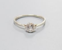 A white metal and solitaire diamond set ring, size K/L, gross weight 2.4 grams,the stone weighing