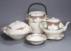 A Crown Ducal Art Deco 'Orange Tree' breakfast, tea and coffee service, to include a biscuit barrel,