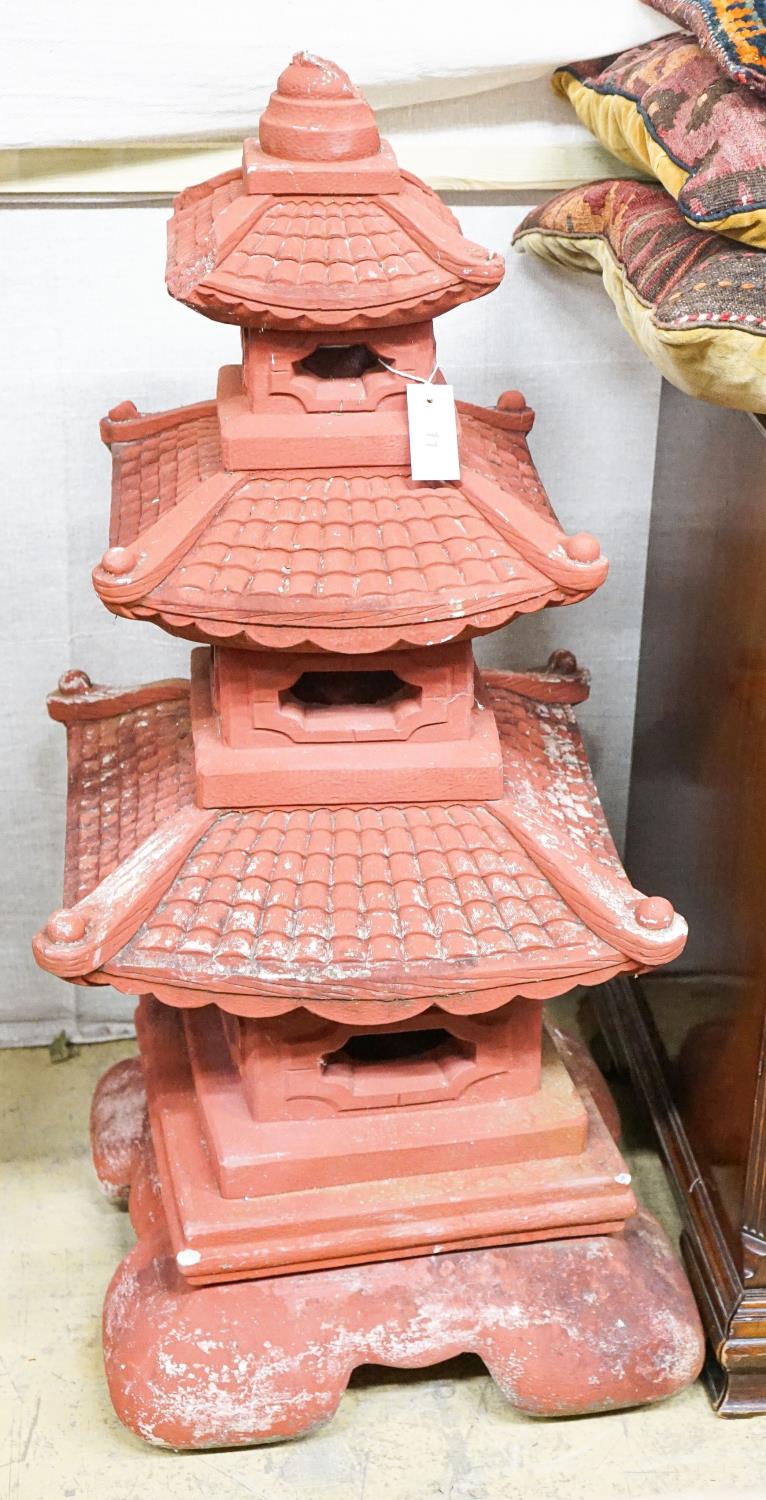 A painted reconstituted stone sectional pagoda garden ornament, height 104cm