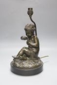 A late 19th century French bronze lamp base, putto and dove,34cm total