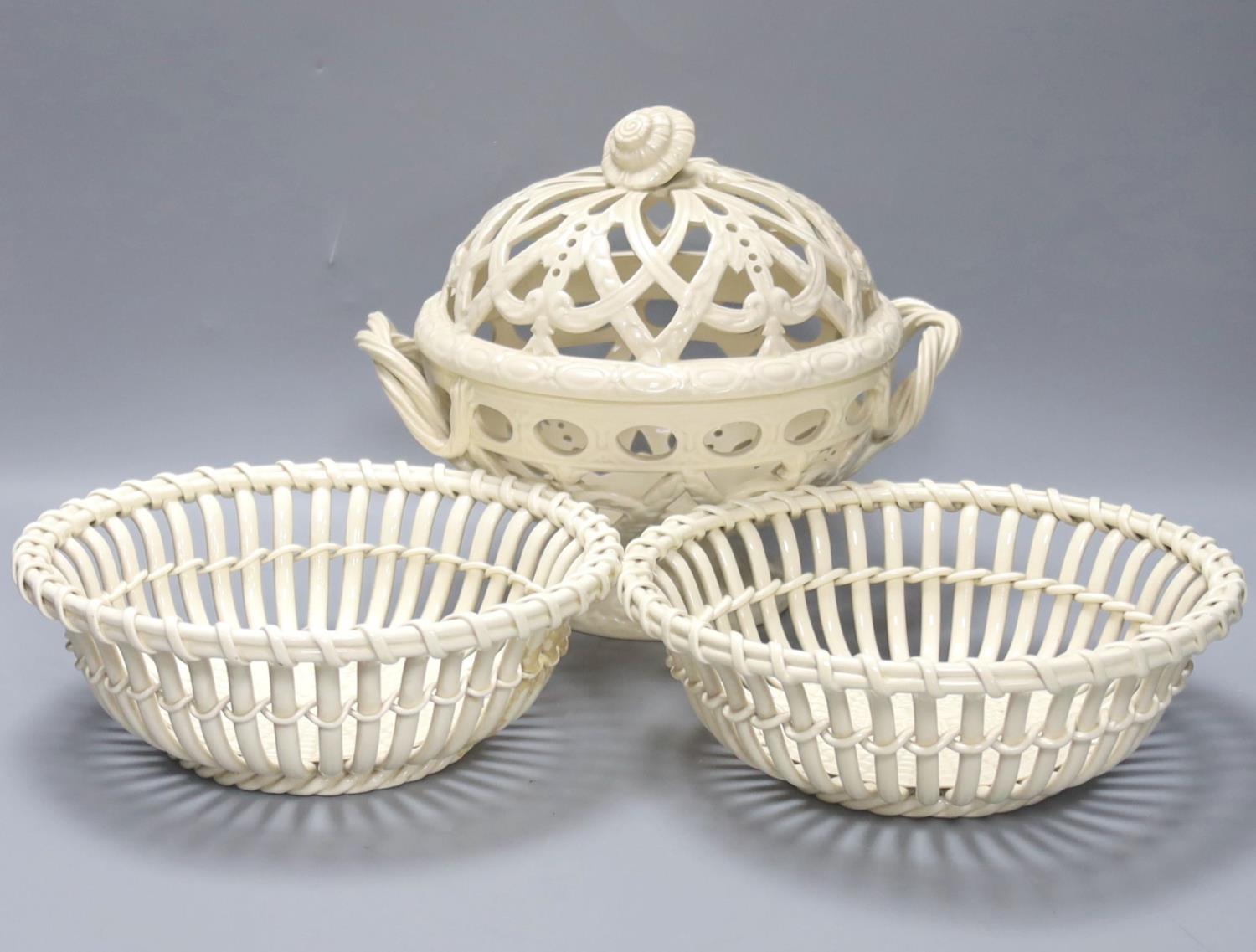 A Victorian Wedgwood creamware covered basket and two Continental creamware baskets,22cm