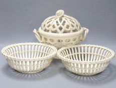 A Victorian Wedgwood creamware covered basket and two Continental creamware baskets,22cm