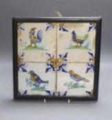 A 17th century Dutch delft four-tile panel, polychrome-decorated with birds and with fleur-de-lys to