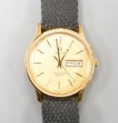 A gentleman's steel and gold plated Omega Seamaster quartz wrist watch, on associated fabric