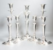 A set of four George V silver oval candlesticks, Atkin Brothers, Sheffield, 1911, height 24.2cm,