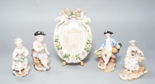 A pair of Meissen groups holding chickens, 10.5cm, a pair of Sitzendorph figures and a Sitzendorf