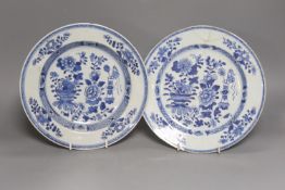 Six 18th century Chinese Export blue and white dishes with floral decoration and five matching