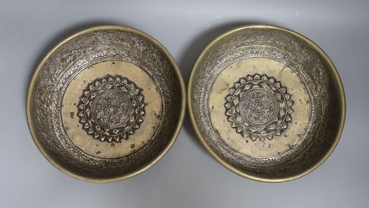 A pair of Far Eastern embossed silvered metal circular bowls,Dia 22.5cm - Image 2 of 2