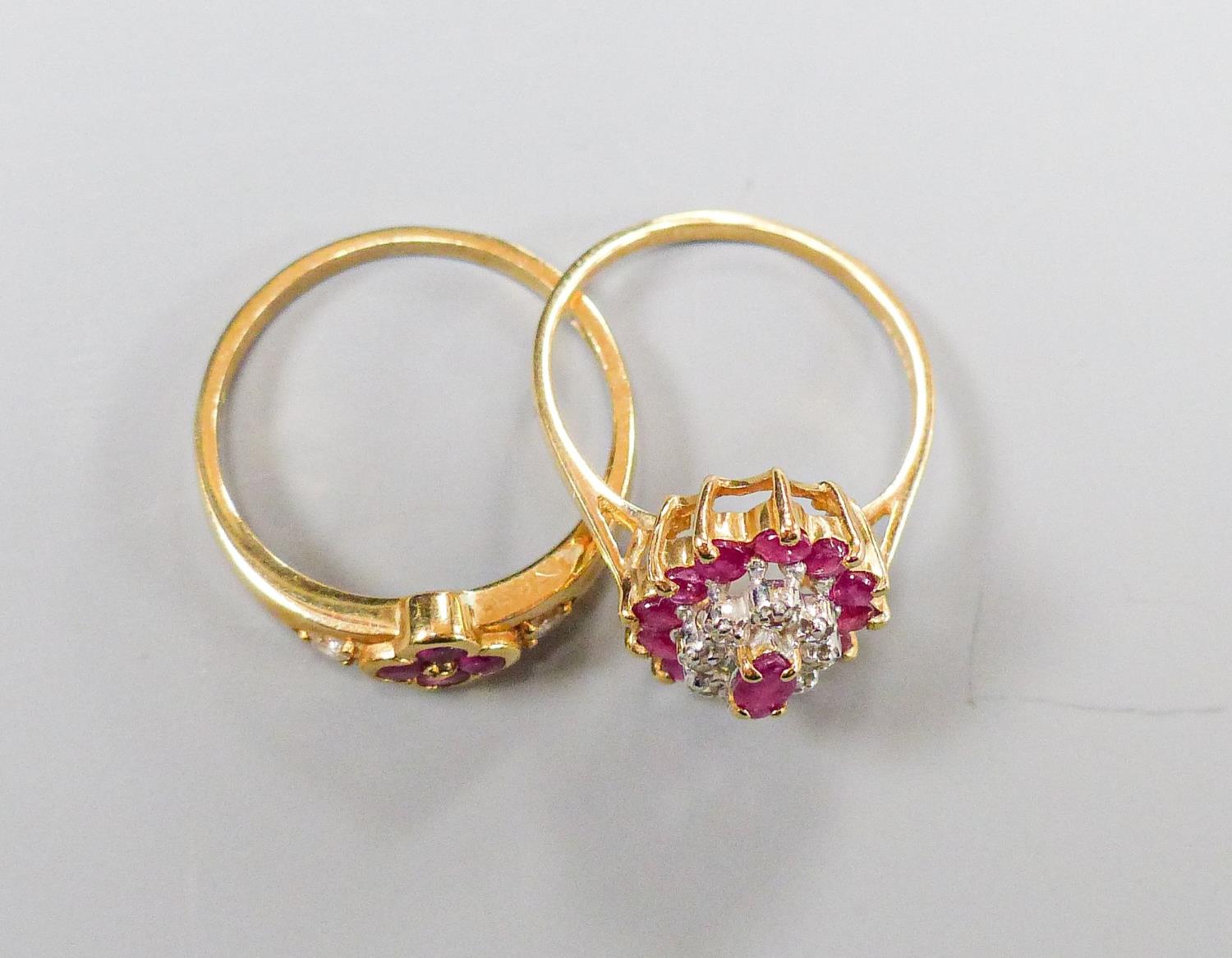 A 9ct yellow gold, ruby and diamond oval cluster ring, size M and another similar 9ct ring, gross - Image 2 of 4