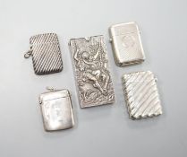 Four assorted silver vesta cases, largest 56mm and a late Victorian repousse silver rectangular
