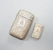 A late 19th century French embossed white metal cigarette case, 76mm, with monogram applique and a