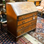 A George III mahogany bureau, with fall front and four drawers, width 91cm, depth 50cm, height