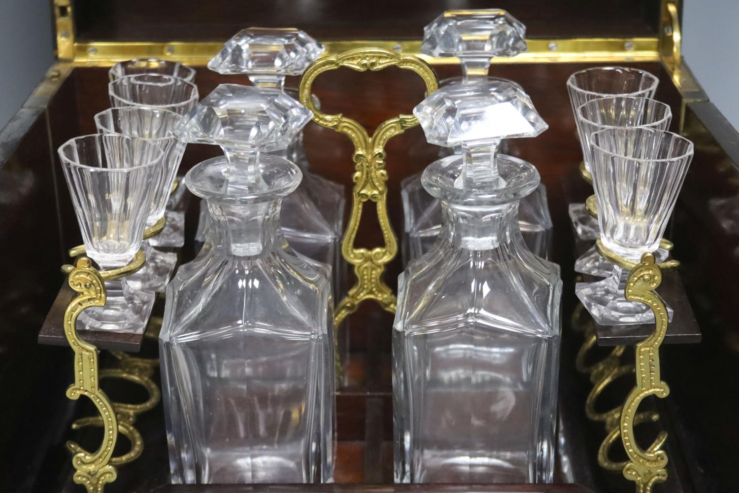 A mid-19th century French ebonised and brass-inlaid decanter case, fitted four decanters and seven - Image 2 of 4