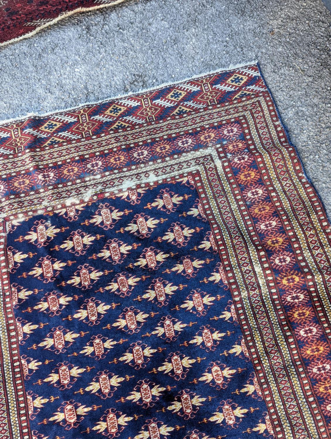 A Bokhara blue ground rug, 191 x 126cm - Image 5 of 6