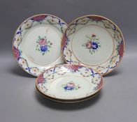 Three early 19th century Chinese polychrome-decorated shallow dishes and a matching plate (one