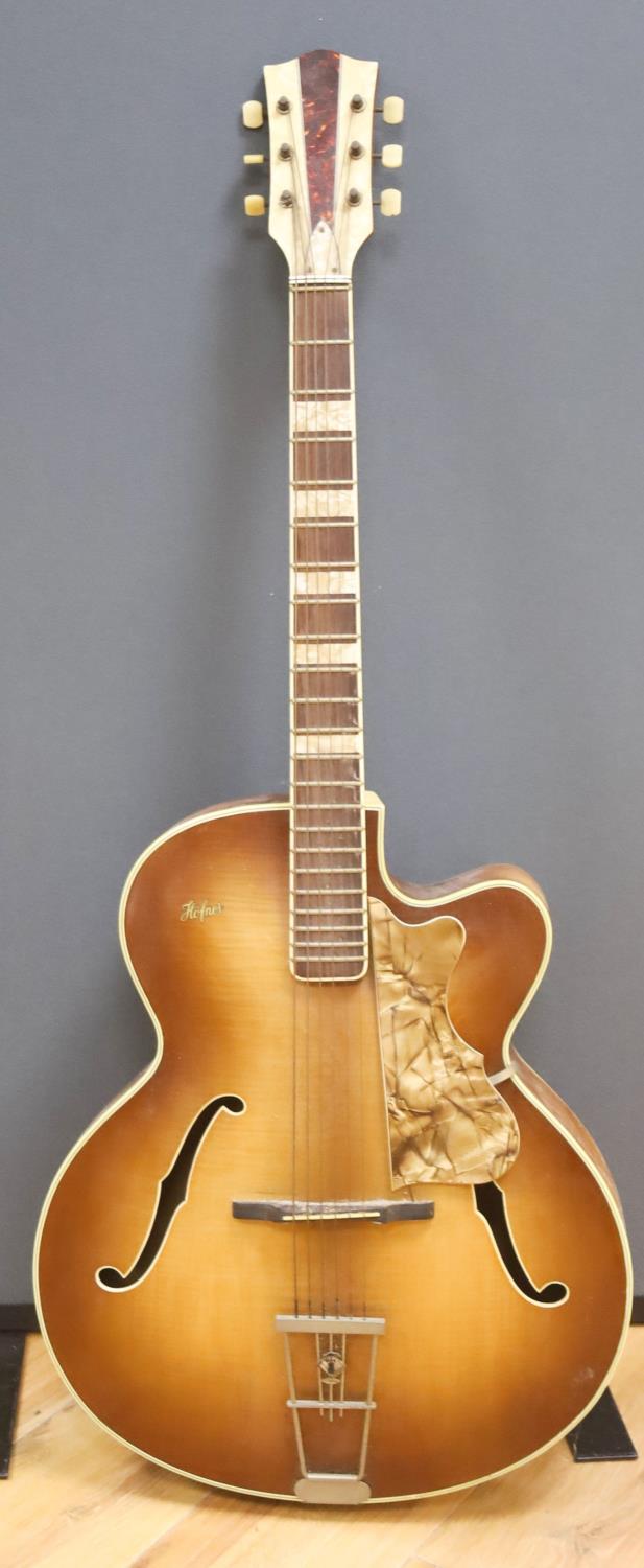 A Hofner acoustic f-hole guitar, circa 1950, having mother of pearl and tortoiseshell inlay to