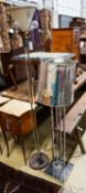 A mid century design perspex column uplighter floor lamp together with a chrome floor lamp, larger