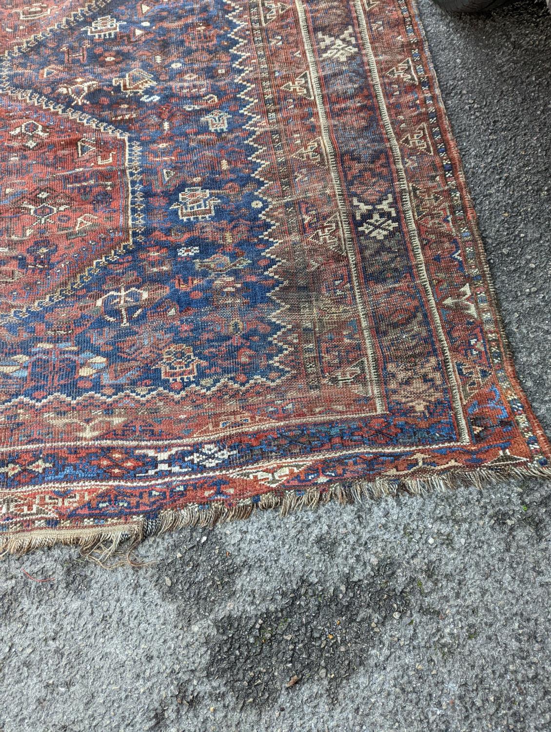 An antique Shirvan red ground carpet (worn), 295 x 207cm - Image 2 of 7