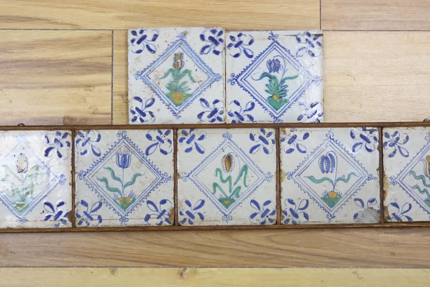 Seven 17th century Dutch Delft tiles, polychrome-decorated with tulips and having fleur-de-lys - Image 3 of 4