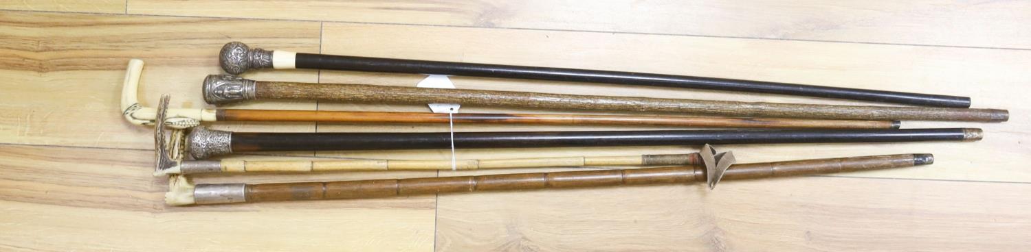 A silver-topped horn and ivory handled walking sticks (6)
