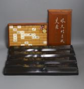 A Chinese Mah-Jong set, in box with stands