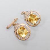 A 9ct mounted step-cut octagonal citrine pendant, 29mm and a matching brooch with suspension pin,