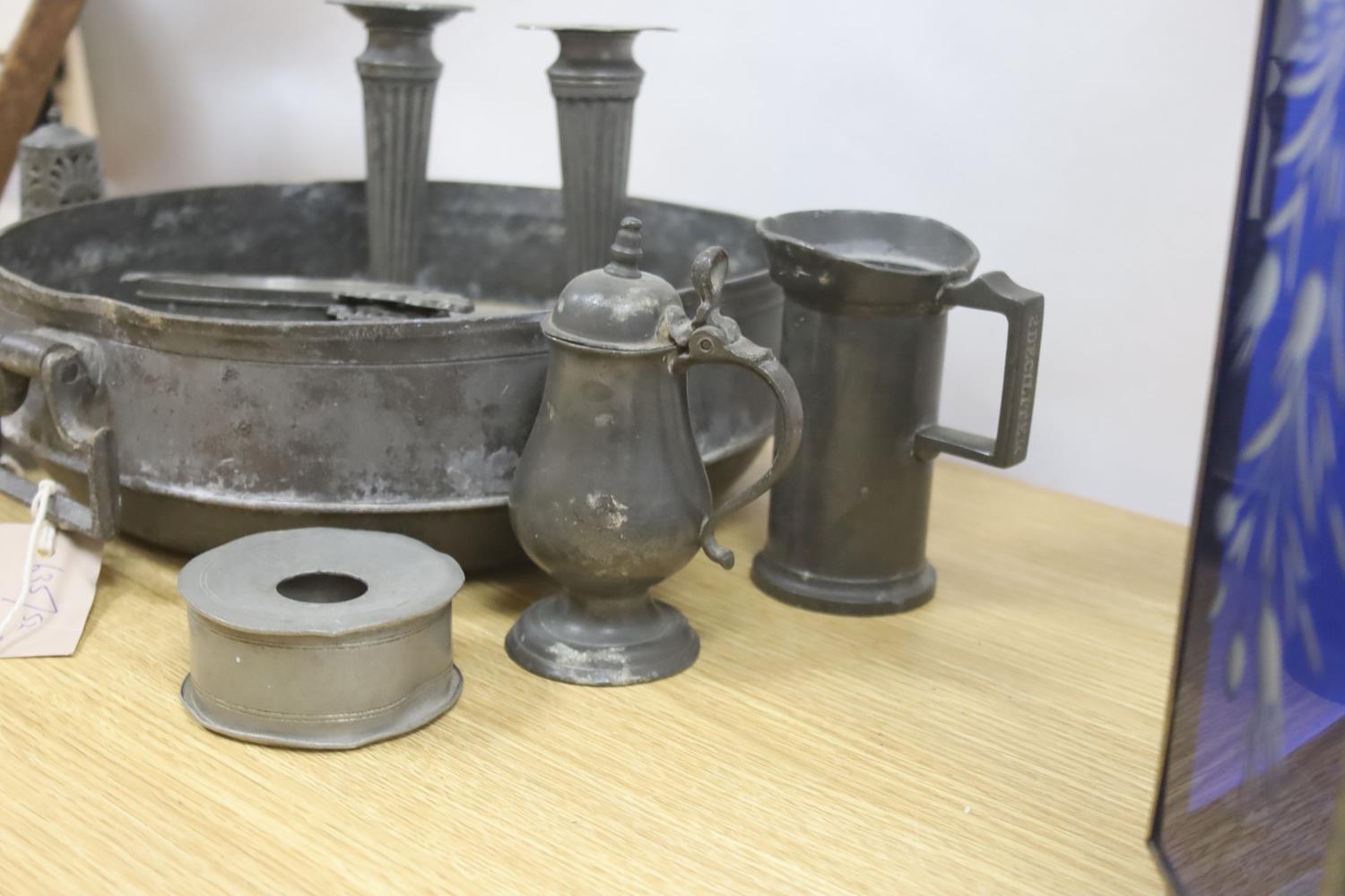 A collection of Dutch antique pewter, including two-handled bowl, wine taster, measures, etc. - Image 4 of 4