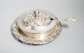 A Chinese white metal butter dish, on stand with knife by Tack Hing, with glass liner, 14.2cm.