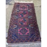 A Bokhara rug, 180 x 101cm