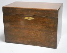 A Whitmore & Bayley oak cigar box and cigars, 1920s, some tubes empty