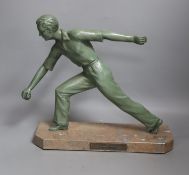 An Art Deco model of a gentleman playing boules. Marble base with plaque reading ‘Les boulistes de