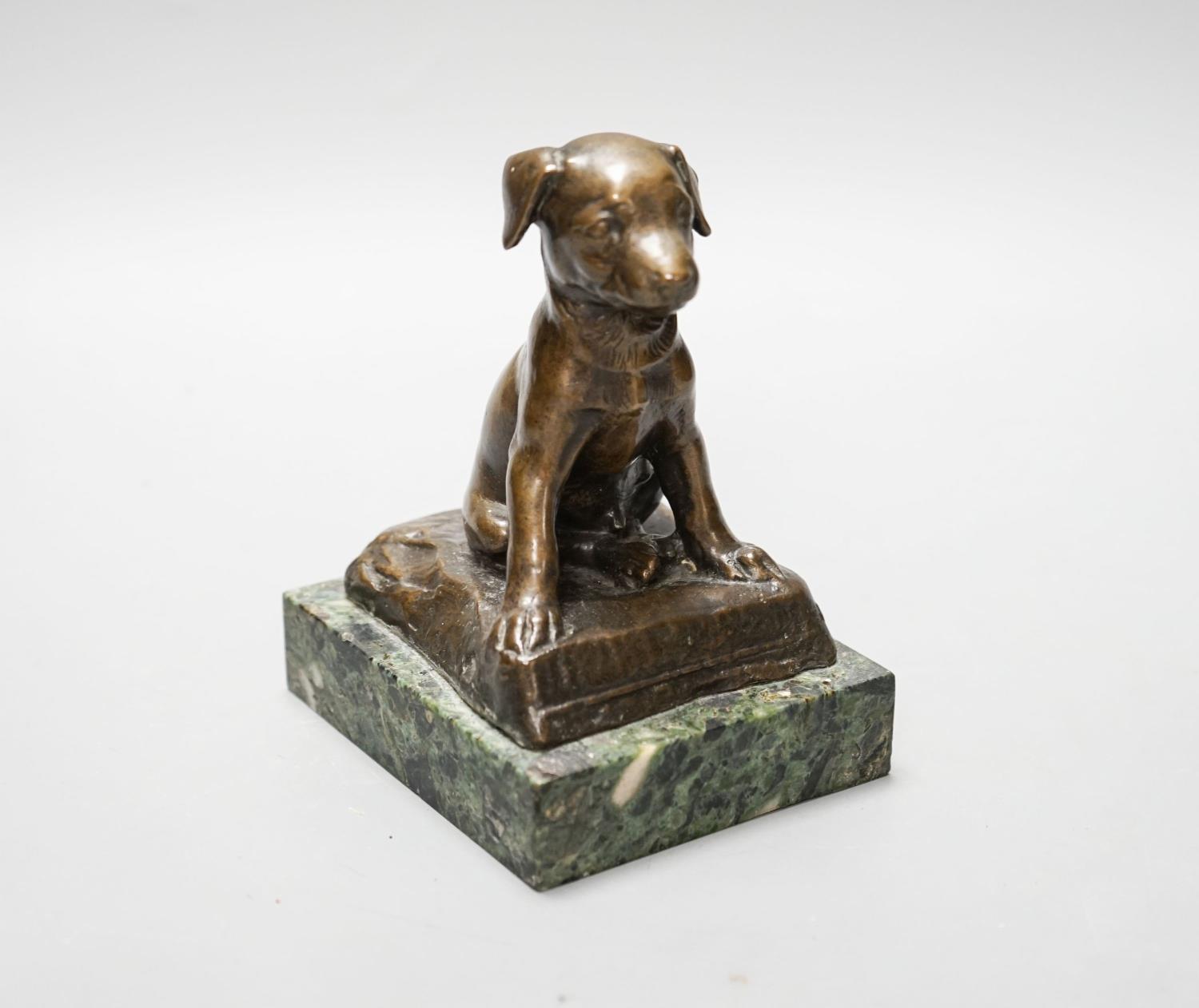 An early 20th century bronze figure of a seated puppy, 13cm