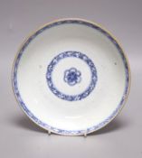 An 18th century Chinese shallow circular blue and white dish with incised decoration,Dia 22cm