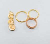 Two 22ct yellow gold wedding rings, 5.7 grams, a 9ct rose gold wedding band 4.6 grams and four