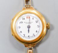 A lady's George V 18ct gold cased manual wind wrist watch, lacking bracelet, case hallmarked for