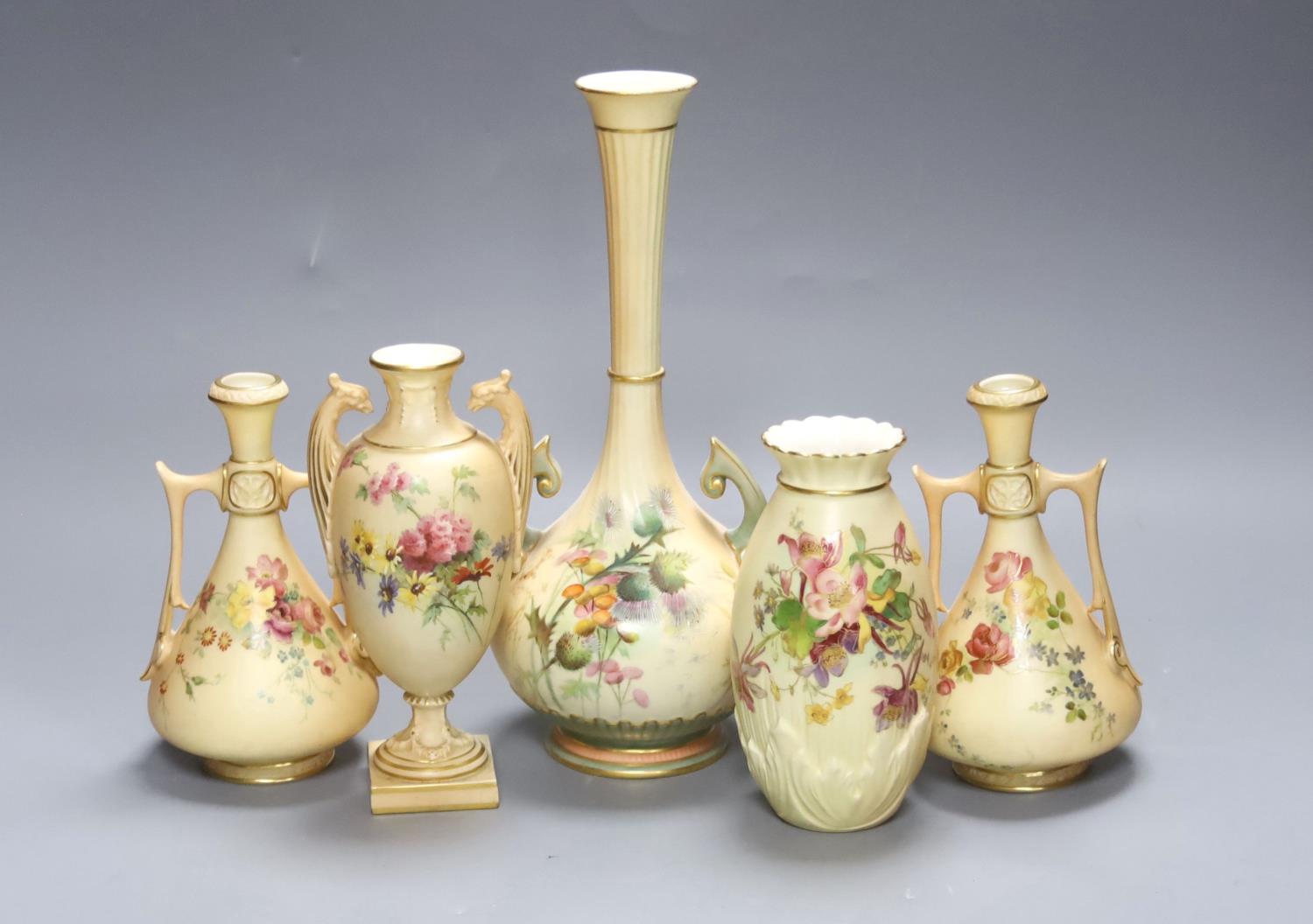 A group of Royal Worcester blush ivory - a pair of vases, and three other vases,25cm